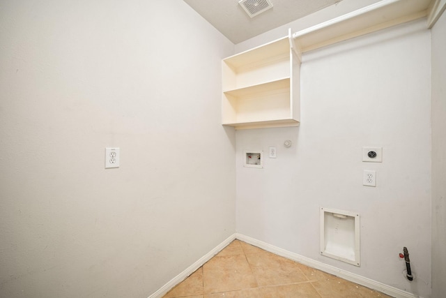 washroom with hookup for a washing machine, visible vents, gas dryer hookup, electric dryer hookup, and laundry area