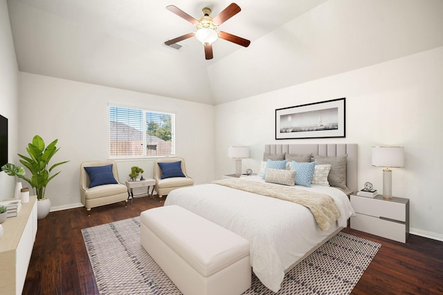 bedroom with a ceiling fan, baseboards, vaulted ceiling, and wood finished floors