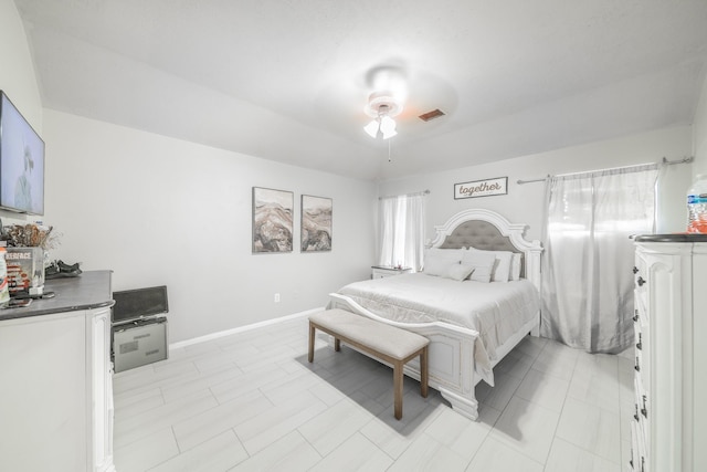 bedroom with visible vents, ceiling fan, and baseboards