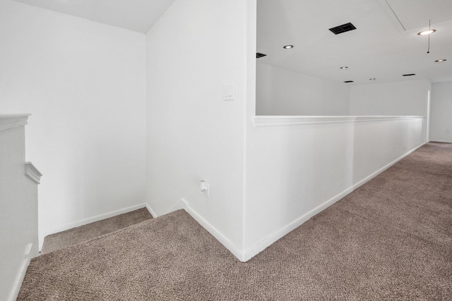 hall with recessed lighting, visible vents, baseboards, carpet, and attic access