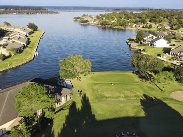 birds eye view of property with a residential view and a water view