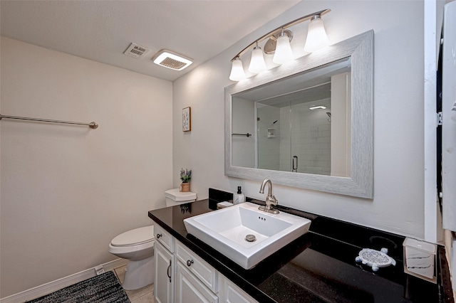 full bathroom with a stall shower, baseboards, visible vents, toilet, and vanity