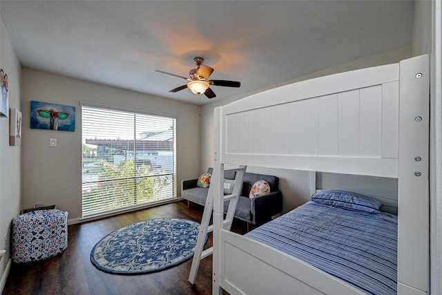 bedroom with a ceiling fan and wood finished floors