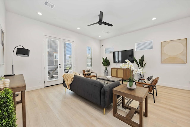 1909 Johanna Dr, Houston, TX 77055 - living area featuring a ceiling fan, french doors, light wood-type flooring, baseboards, and recessed lighting
