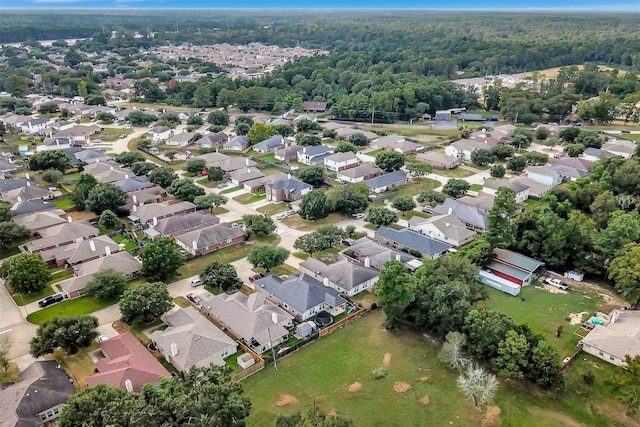 birds eye view of property with a residential view