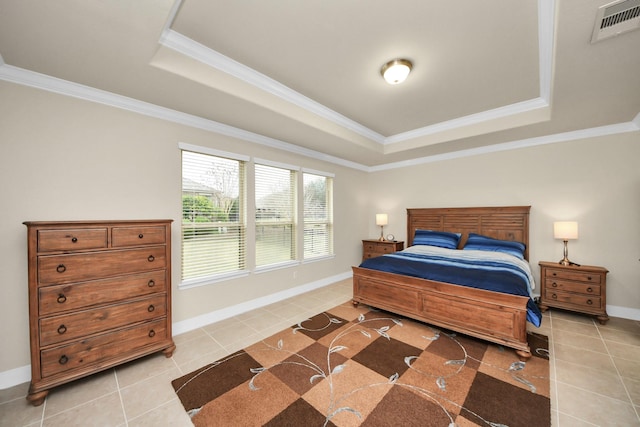 bedroom featuring visible vents, baseboards, ornamental molding, a tray ceiling, and light tile patterned flooring