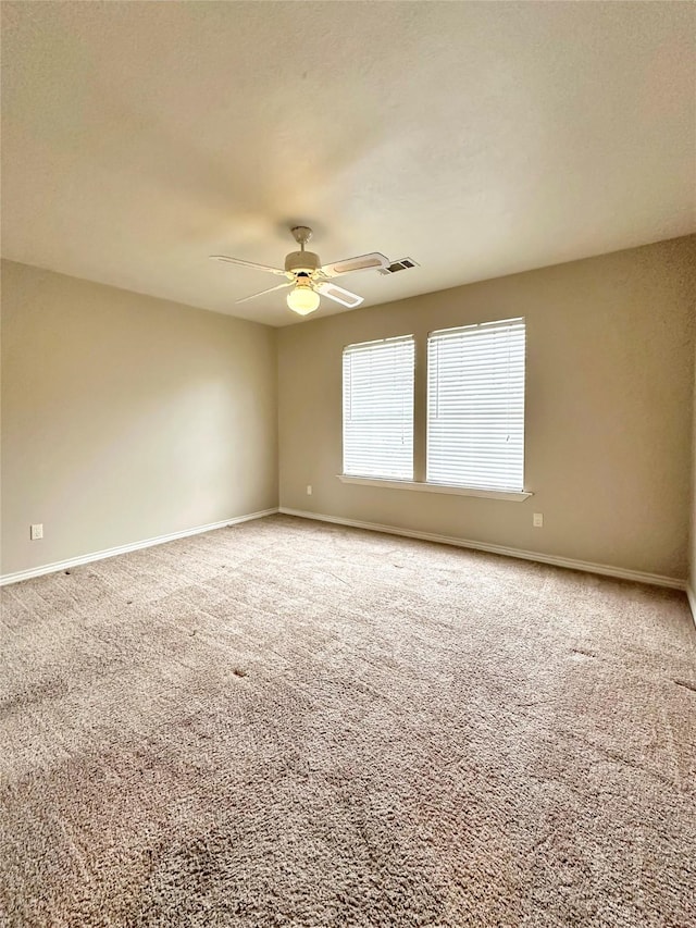 17439 Fairway Oaks Dr, Spring, TX 77379 - unfurnished room featuring carpet flooring, a ceiling fan, and baseboards