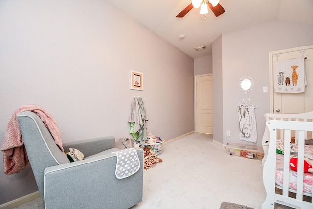 bedroom with carpet floors, a ceiling fan, visible vents, vaulted ceiling, and baseboards