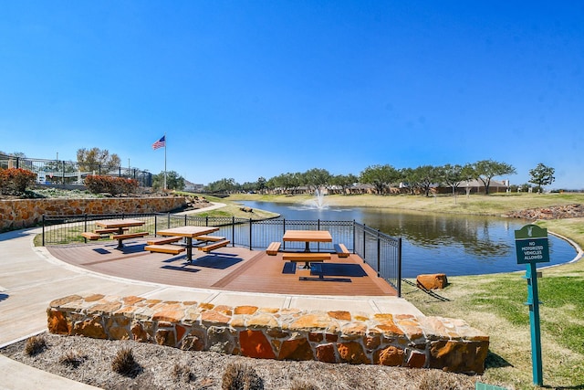 dock area with a water view