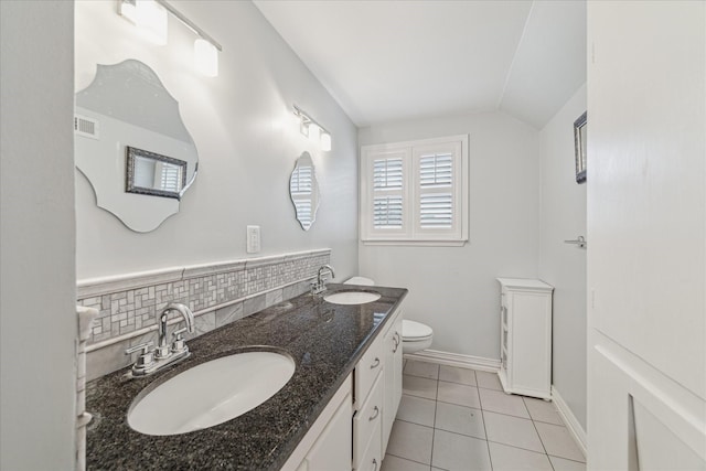 full bathroom featuring visible vents, a sink, toilet, and tile patterned floors