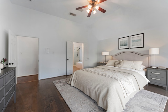 bedroom with ceiling fan, high vaulted ceiling, visible vents, baseboards, and dark wood finished floors