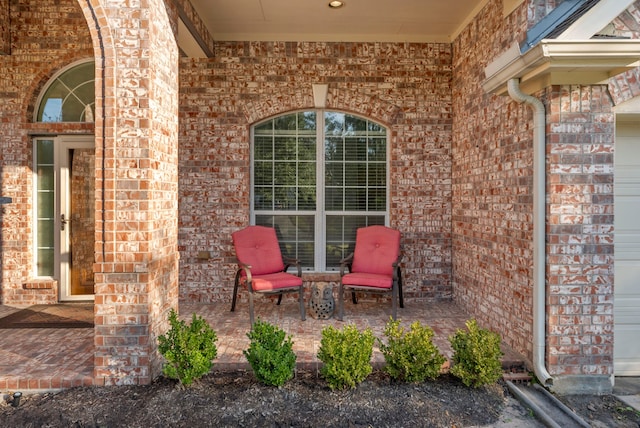 view of patio / terrace featuring an attached garage