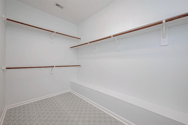 spacious closet with visible vents