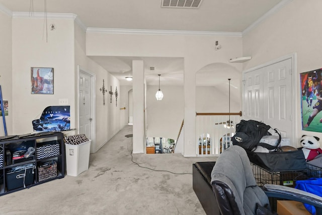 interior space featuring arched walkways, carpet flooring, visible vents, and crown molding