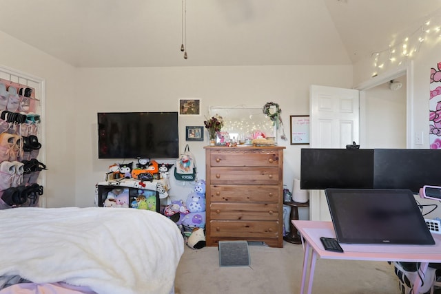 carpeted bedroom with vaulted ceiling