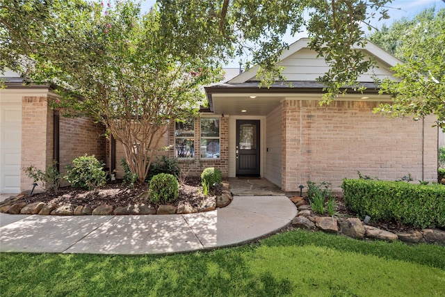 view of front of property with brick siding