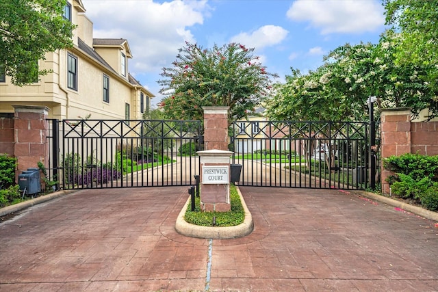 view of gate with fence