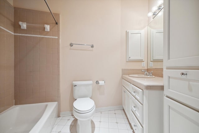 full bathroom featuring toilet, baseboards, shower / bathing tub combination, and vanity