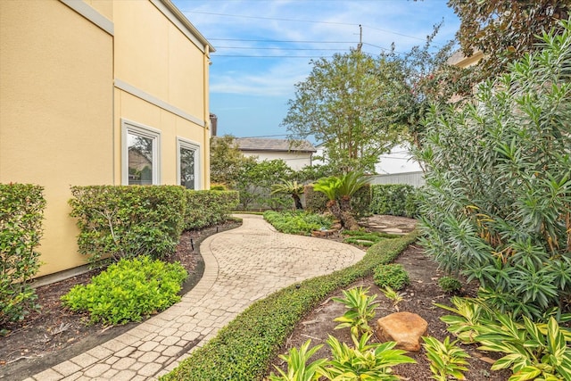 view of yard featuring a patio and fence