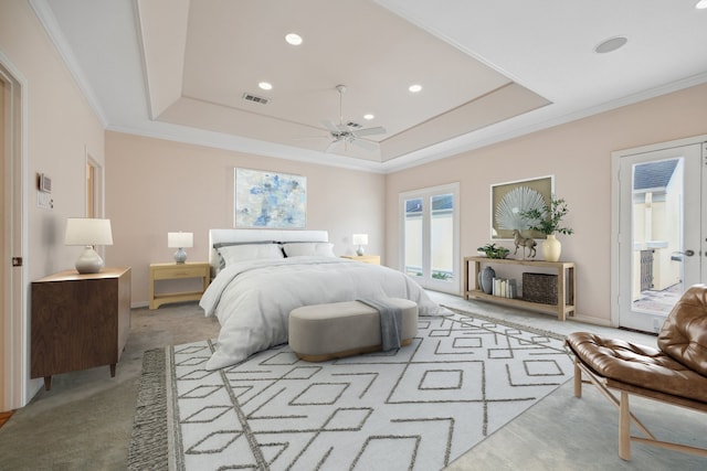 bedroom featuring light carpet, access to outside, a tray ceiling, and ornamental molding