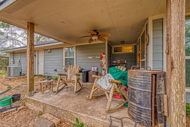 view of patio with ceiling fan and central AC unit