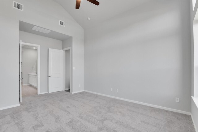 2920 Apple Rose, Katy, TX 77493 - unfurnished bedroom featuring visible vents, baseboards, lofted ceiling, and carpet floors