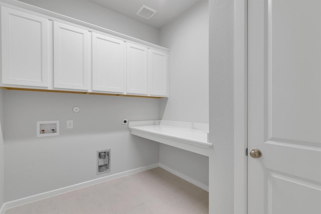 2920 Apple Rose, Katy, TX 77493 - laundry area featuring hookup for a washing machine, baseboards, visible vents, cabinet space, and electric dryer hookup
