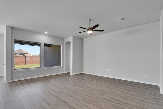 2920 Apple Rose, Katy, TX 77493 - unfurnished room featuring visible vents, baseboards, and wood finished floors