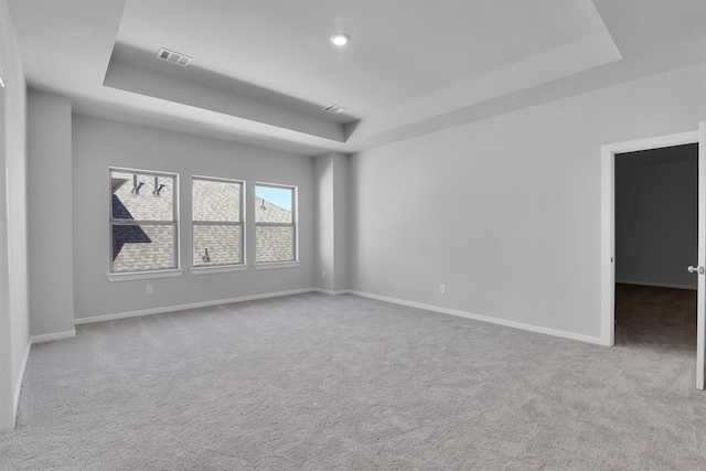 2920 Apple Rose, Katy, TX 77493 - empty room featuring a raised ceiling, carpet flooring, baseboards, and visible vents