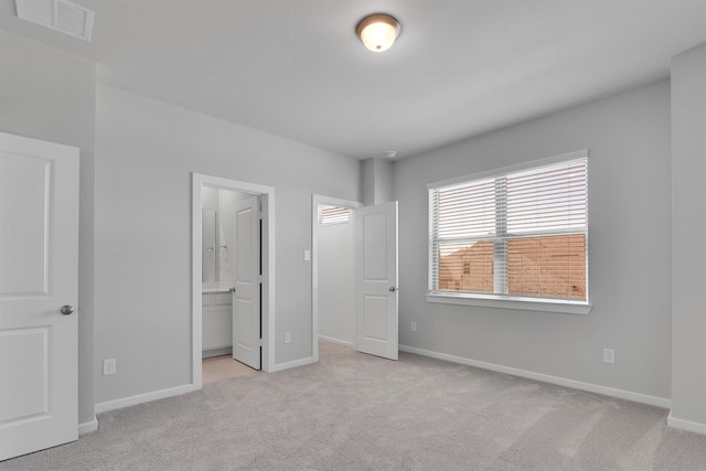 2920 Apple Rose, Katy, TX 77493 - unfurnished bedroom with ensuite bath, visible vents, baseboards, and carpet