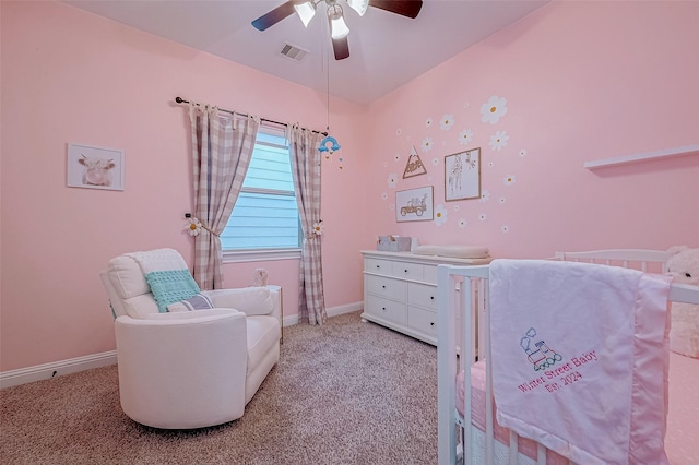 bedroom with light carpet, visible vents, and baseboards