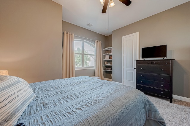 bedroom featuring carpet, visible vents, ceiling fan, and baseboards