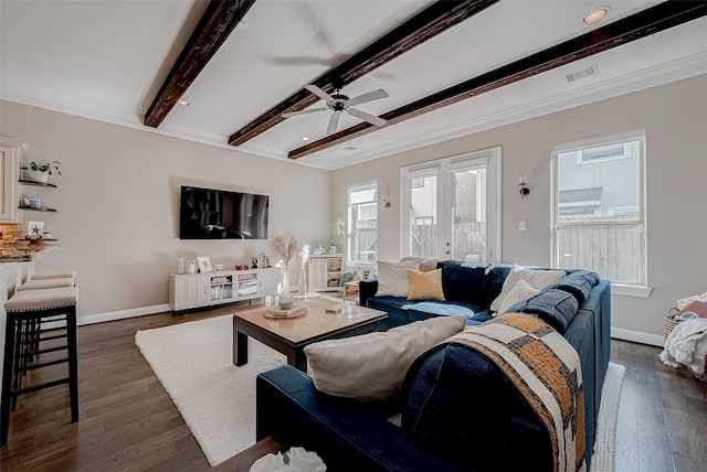 living area with recessed lighting, visible vents, dark wood-type flooring, beamed ceiling, and baseboards