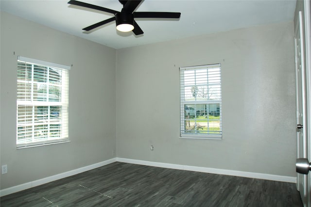 817 S Morgan St, Angleton, TX 77515 - spare room featuring healthy amount of natural light, dark wood finished floors, and ceiling fan