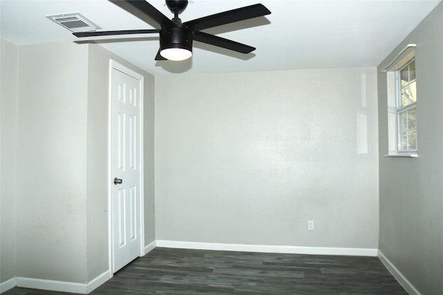 817 S Morgan St, Angleton, TX 77515 - empty room with ceiling fan and dark wood-style floors