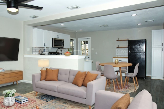 817 S Morgan St, Angleton, TX 77515 - living area with dark wood-style flooring, recessed lighting, and ceiling fan