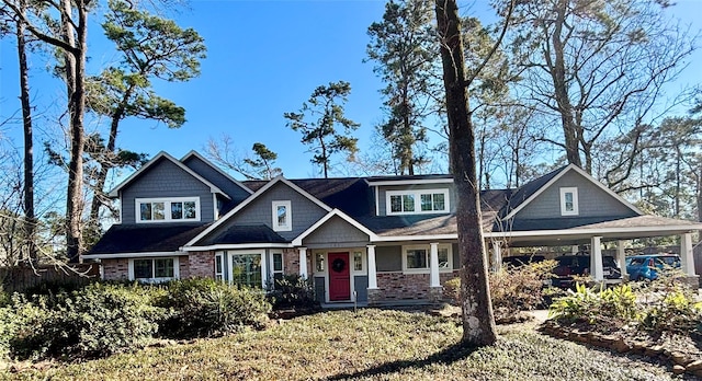 craftsman-style house with an attached carport