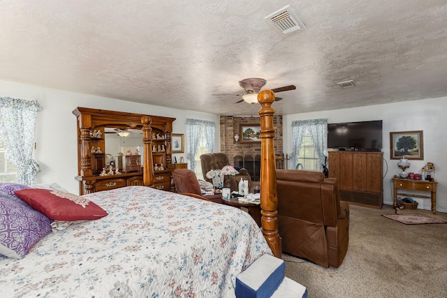 bedroom with visible vents, light carpet, and multiple windows