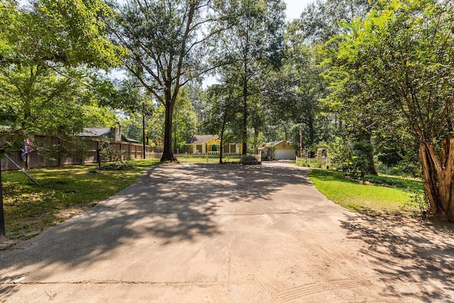 view of gate featuring fence