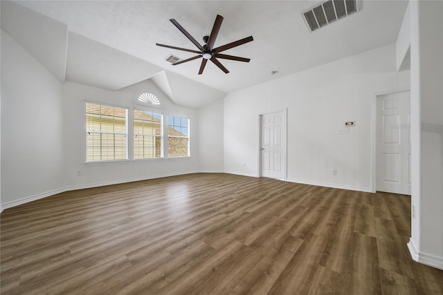 spare room featuring visible vents, dark wood finished floors, and ceiling fan