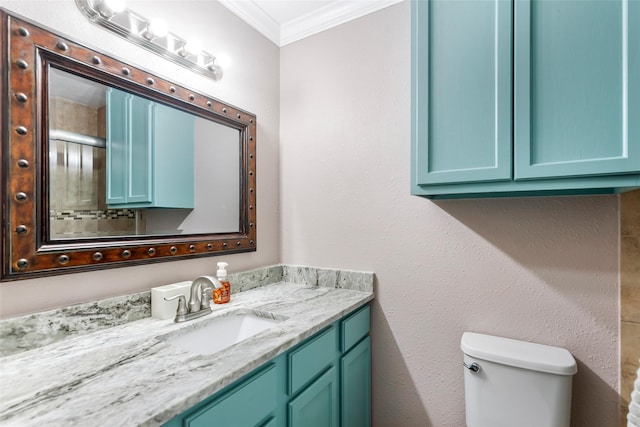 128 Legend Ln, Livingston, TX 77351 - bathroom featuring vanity, ornamental molding, and toilet