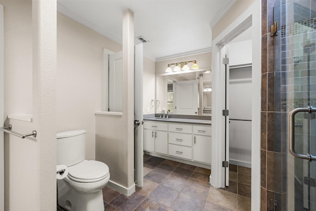 full bath with baseboards, visible vents, tiled shower, crown molding, and vanity