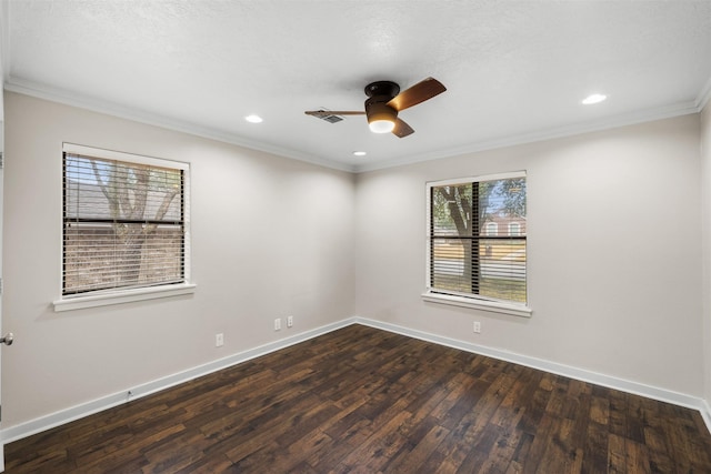 unfurnished room featuring visible vents, crown molding, baseboards, and dark wood-style flooring