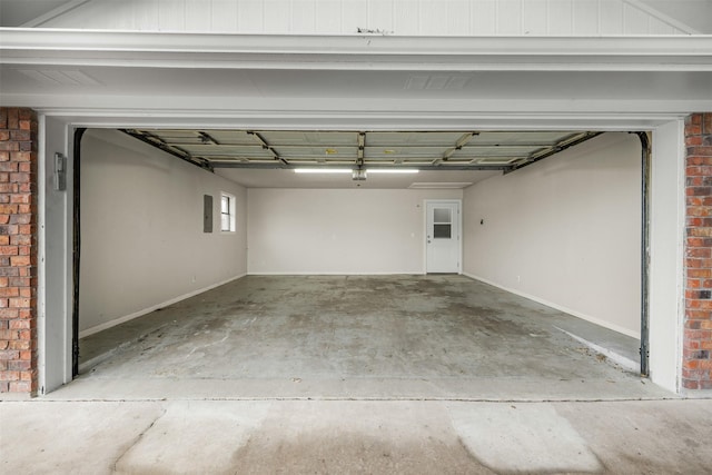 garage featuring baseboards