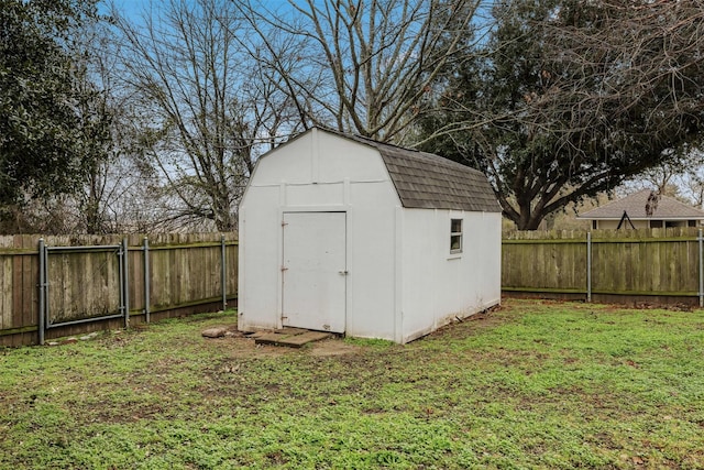 view of shed featuring a fenced backyard