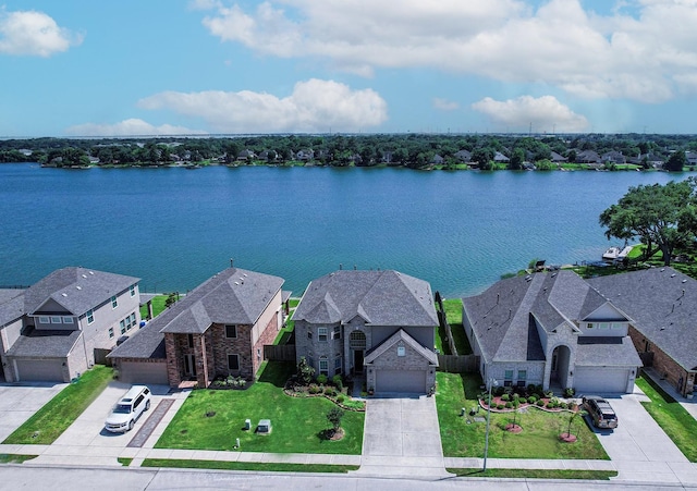 aerial view with a residential view and a water view