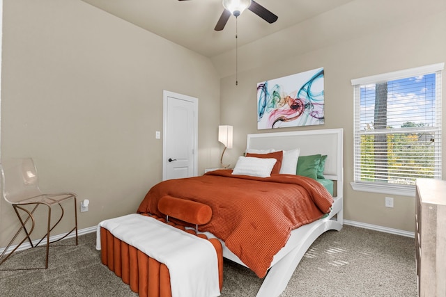 carpeted bedroom with lofted ceiling, ceiling fan, and baseboards