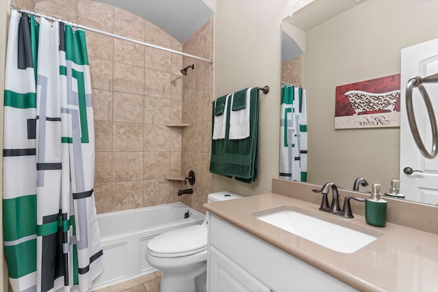 bathroom with toilet, tile patterned floors, shower / bath combo with shower curtain, and vanity