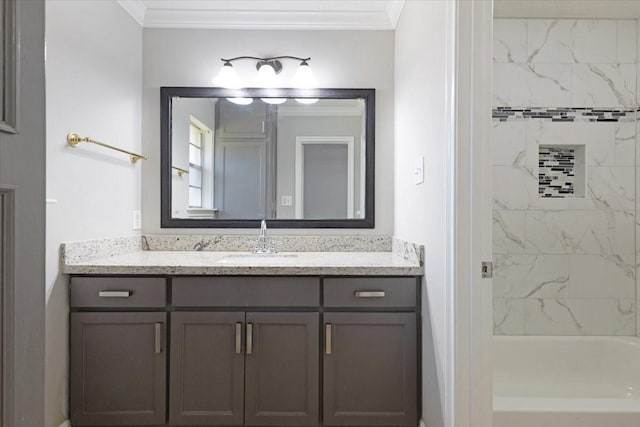 bathroom with ornamental molding, tub / shower combination, and vanity