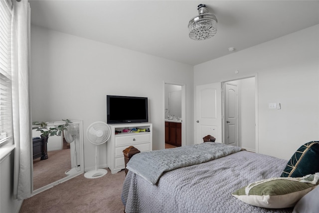 bedroom featuring light colored carpet